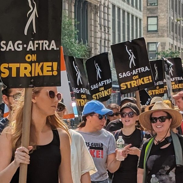 SAG-AFTRA members and supporters strike on the streets with signs, May 2nd, 2023.