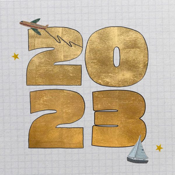 2023 in bold, gold font, surrounded by stars, an airplane, and a boat